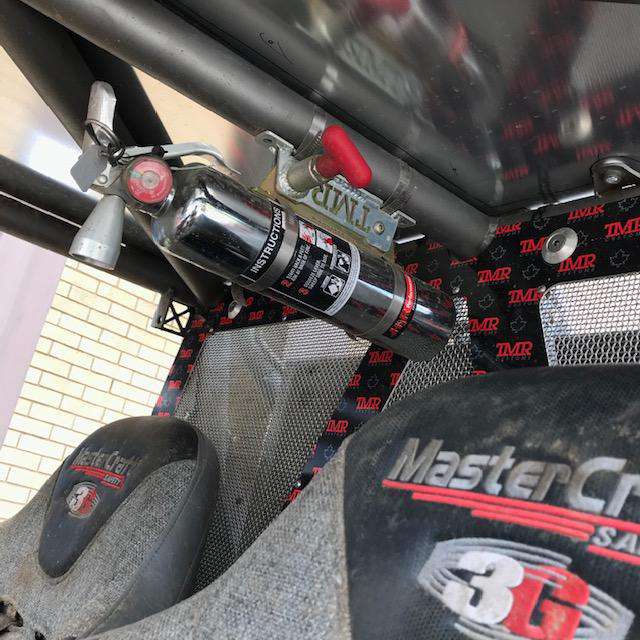 TMR Custom USA rapid release fire extinguisher mount for portable handheld fire extinguishers, auto and shop use, in black metal finish